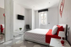 Postel nebo postele na pokoji v ubytování Gaeta, B&B la Loggia