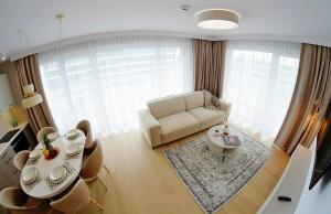 Posezení v ubytování Apartments AQUA & SPA