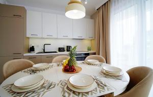 Kuchyň nebo kuchyňský kout v ubytování Apartments AQUA & SPA