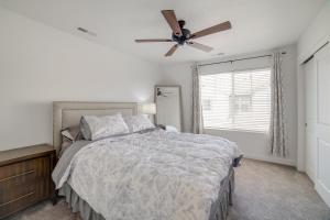 a bedroom with a bed and a ceiling fan at Pool, Park and Peace Skyview Landing in Eagle! in Eagle +23 photos
