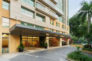 a rendering of the front of a building at JW Marriott Hotel & Suites Saigon, The Apartments in Ho Chi Minh City