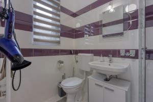 Kúpeľňa v ubytovaní Villa Kontesici 12