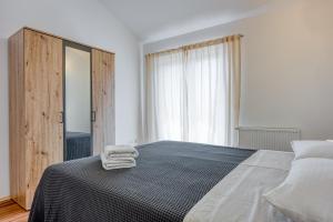 Posteľ alebo postele v izbe v ubytovaní Villa Kontesici 12