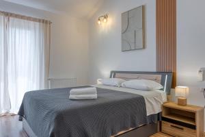 Posteľ alebo postele v izbe v ubytovaní Villa Kontesici 12
