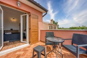 Balkón alebo terasa v ubytovaní Villa Kontesici 12