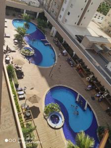 Enjoy Olimpia Park Resorts ! في أوليمبيا: اطلالة علوية على ثلاثة مسابح في مبنى