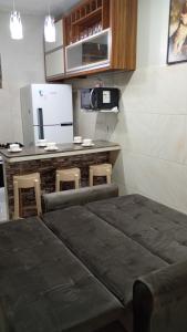 Η κουζίνα ή μικρή κουζίνα στο Apartamento Completo e Centralizado 4
