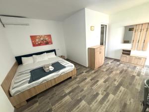 Giường trong phòng chung tại Casa Olimpia 2 Mai