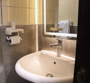 Koupelna v ubytování Nozol Sara residence - نزل ساره + 33 fotografií