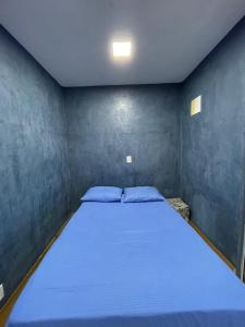 Postel nebo postele na pokoji v ubytování Suíte com Hidro no centro