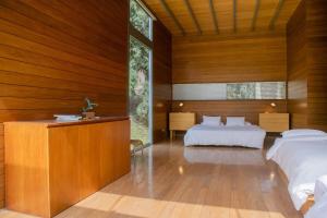Elegant 5BR with Garden view Home in Cieneguilla客房内的一张或多张床位