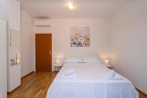 Posteľ alebo postele v izbe v ubytovaní Francesca Guesthouse