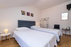 Posteľ alebo postele v izbe v ubytovaní Francesca Guesthouse