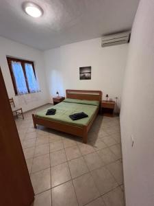 Postel nebo postele na pokoji v ubytování Appartamento Marisa1 a 200mt dalla spiaggia