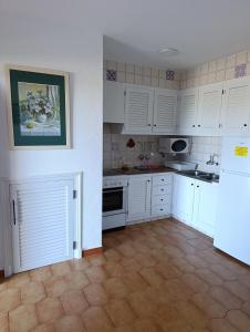 Η κουζίνα ή μικρή κουζίνα στο Apartamento Ideal