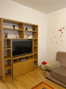 TV a/nebo společenská místnost v ubytování CERCA DE TODO