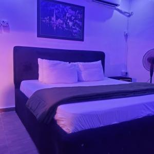 Letto o letti in una camera di Weltons Apartments