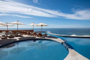 Bazén v ubytování Club Regina Los Cabos nebo v jeho okolí