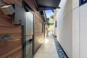 a hallway of a house with a walkway at Shadow Mountain 03 in Aspen +42 photos