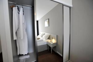 Postel nebo postele na pokoji v ubytování Hotel ZP Palace