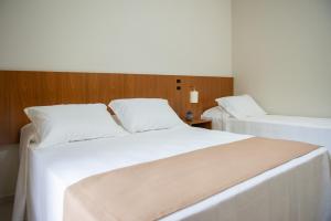 Ένα ή περισσότερα κρεβάτια σε δωμάτιο στο Hotel Quinta do Lago +31 φωτογραφίες