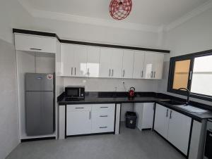 Kuchyň nebo kuchyňský kout v ubytování Apartment type T2 - Imane Kaa + 3 fotografie