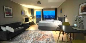 Postel nebo postele na pokoji v ubytování #1 Studioapartment mit Loreleyblick direkt an der schönsten Etappe des Rheinsteigs