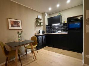 Kuchyň nebo kuchyňský kout v ubytování #1 Studioapartment mit Loreleyblick direkt an der schönsten Etappe des Rheinsteigs