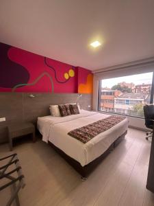 Postel nebo postele na pokoji v ubytování Agora Suites Self-Service Boutique Hotel