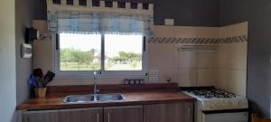 Kuchyň nebo kuchyňský kout v ubytování Cabañas Mini Tinkuy + 4 fotografie