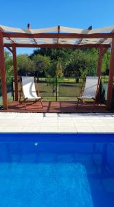 Bazén v ubytování Cabañas Mini Tinkuy nebo v jeho okolí