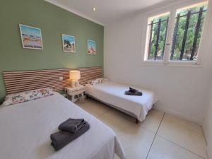 Posteľ alebo postele v izbe v ubytovaní Villa Vistaero