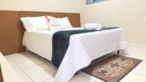 Voodi või voodid majutusasutuse Casa Corporativa - 3km do Centro - 35 toas +16 fotot