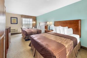 Postel nebo postele na pokoji v ubytování Best Western Plus Atrium Inn