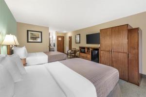 Postel nebo postele na pokoji v ubytování Best Western Plus Atrium Inn