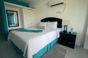 Postel nebo postele na pokoji v ubytování Match Resort