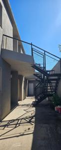 a staircase on the side of a building at La NIÑA 6 in Jesús María