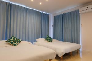Giường trong phòng chung tại Kunigami-gun - House / Vacation STAY 2562