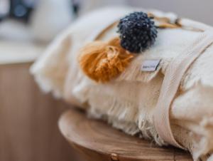 a stuffed animal sitting on top of a pillow at Caba Beach Condo Modern, 2-bedroom cabin, walk to the beach! 3-night minimum stay in Cabarita Beach