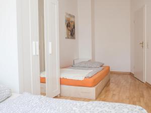 Łóżko lub łóżka w pokoju w obiekcie Ferienwohnung Leipzig Ost