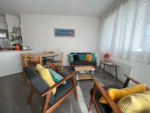 a living room with chairs and a table at Appartement à Ciboure avec piscine chauffée et parking privé - FR-1-239-560 in Ciboure