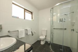 Koupelna v ubytování Allan Cunningham Motel + 37 fotografií