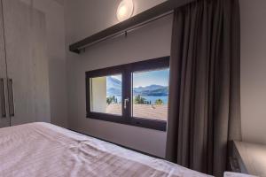 A bed or beds in a room at Residenza Decimina