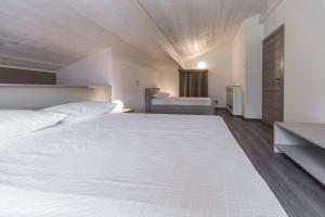 A bed or beds in a room at Residenza Decimina