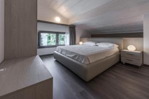 A bed or beds in a room at Residenza Decimina