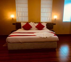 Postel nebo postele na pokoji v ubytování Royal Retreat ,Kandy