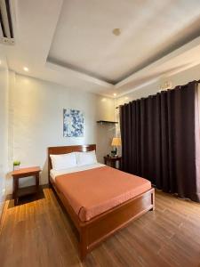 Ένα ή περισσότερα κρεβάτια σε δωμάτιο στο Nadelmar Hotel and Resort