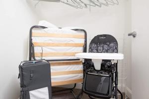 a room with a bunk bed with a skateboard on it at North End 2BR Condo w Pool & Gym in Boston +49 photos