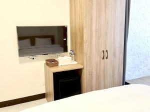 TV a/nebo společenská místnost v ubytování Sleep B&B
