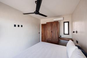 Ένα ή περισσότερα κρεβάτια σε δωμάτιο στο Two-bedroom waterfront villa